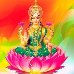 Goddess of prosperity Lakshmi sits in a lotus