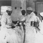 Saint Luke (left) in the operating room